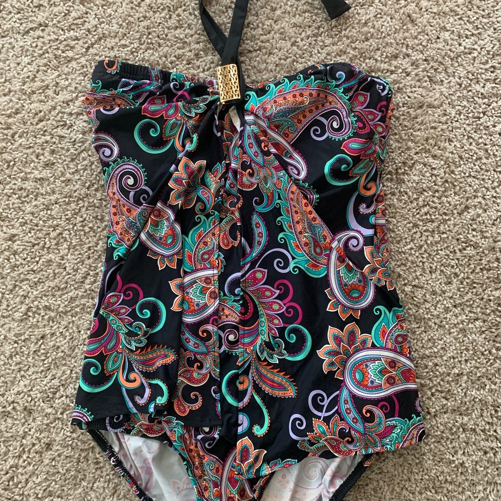 Tara Grinna one-piece swimsuit.